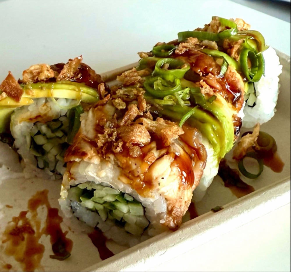 Avocado-topped sushi rolls