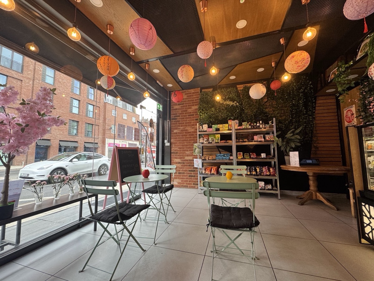 Inside Daruma, snack shelves and bistro tables